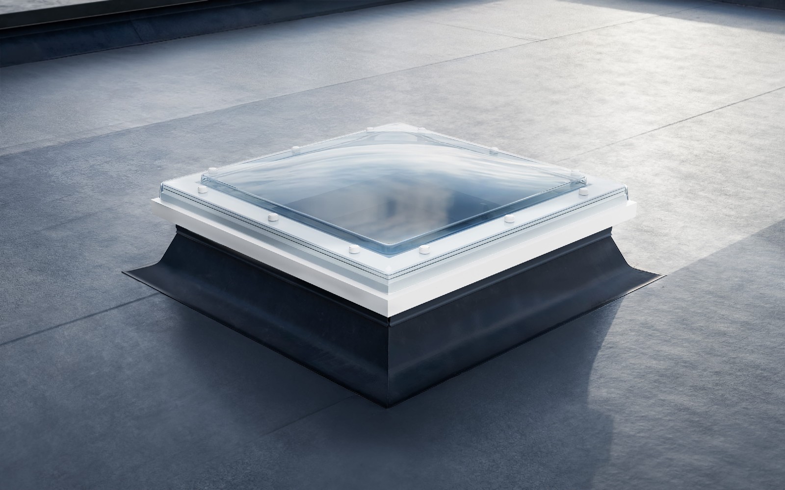 Mardome polycarbonate dome rooflight installed on a commercial flat roof