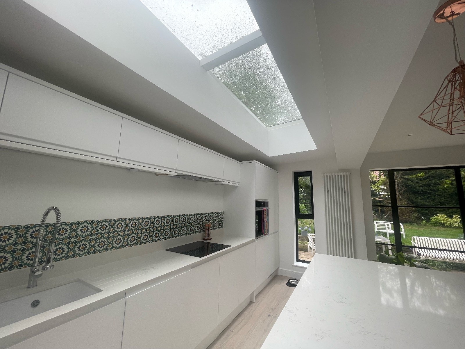Completed Glass Link modular rooflight installation above a modern kitchen